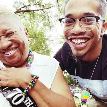 Gary LeRoi Gray posing for a photo shoot with his mother during her 70th birthday.